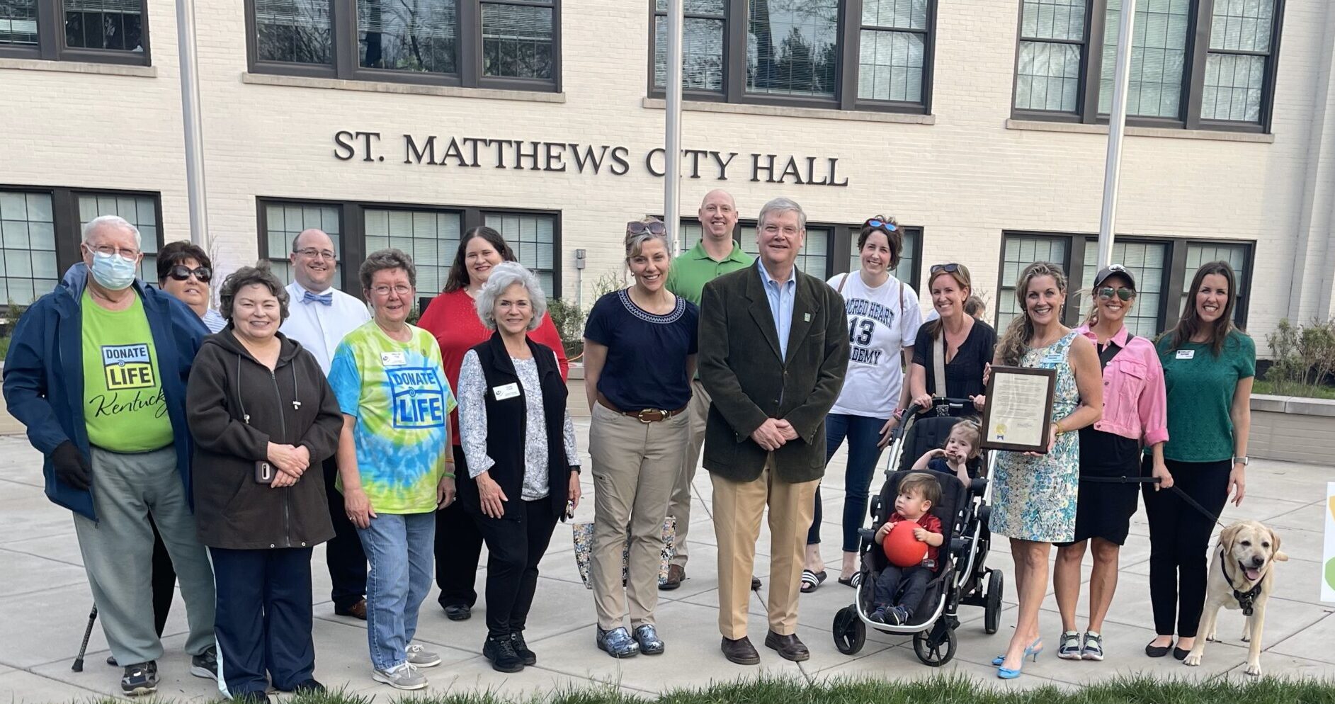 Group standing in front of St Matthews City Hall